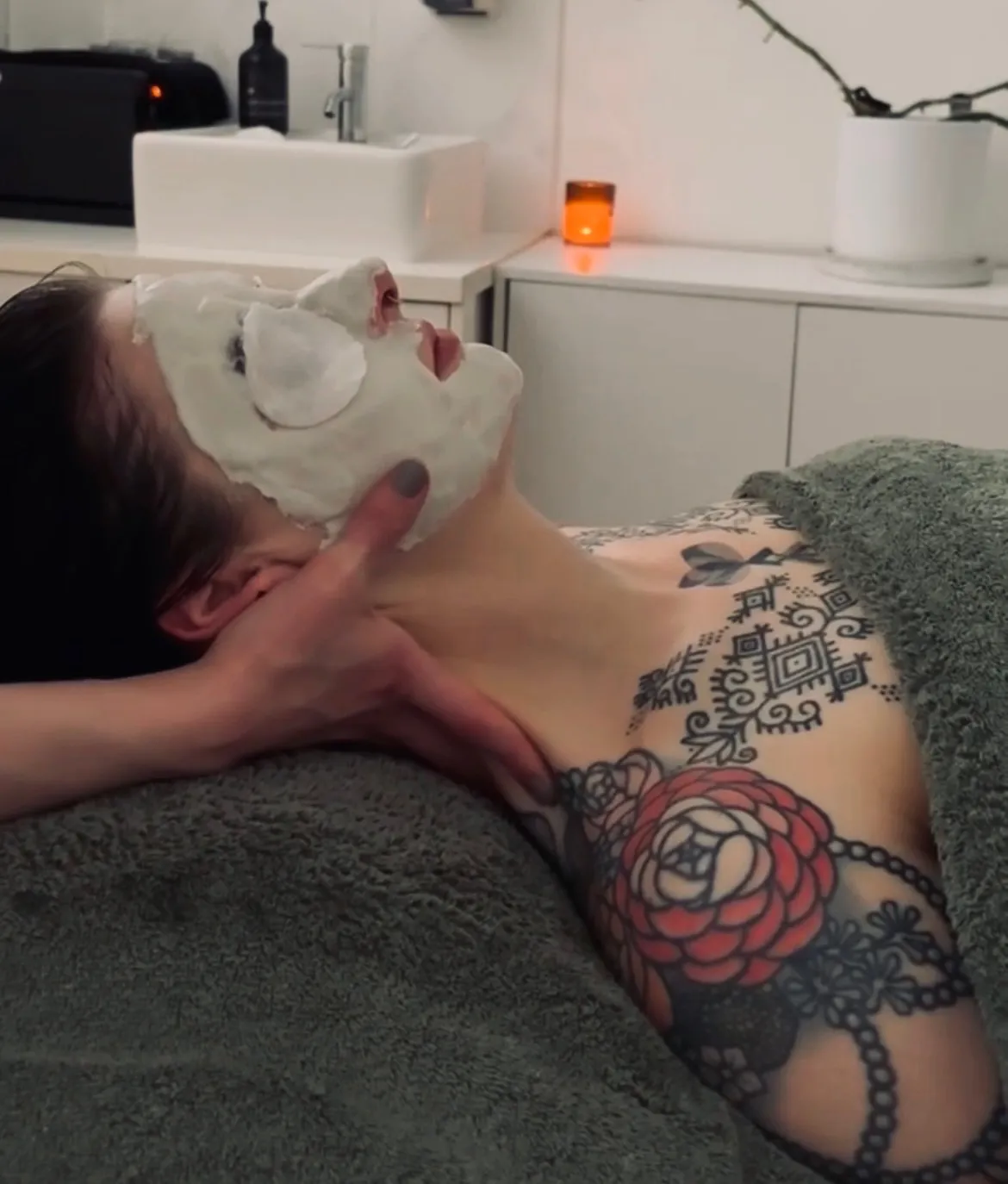 Holistic facial treatment with a mask applied